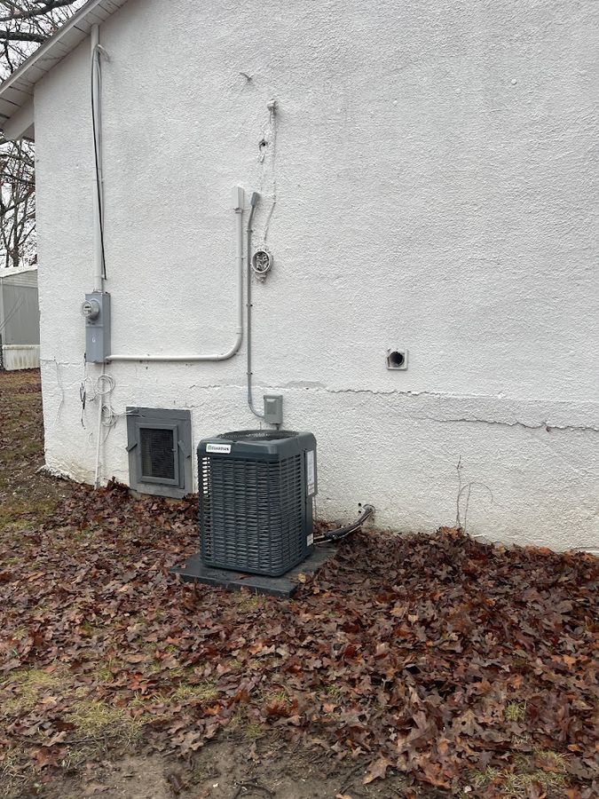 Outdoor AC unit after a Smith Central service visit in central Missouri