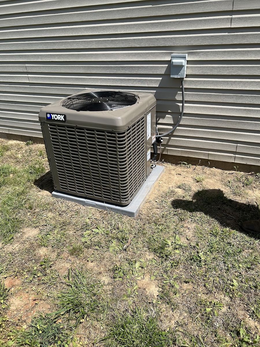 York outdoor AC condenser installed at a Waynesville home by Smith Central